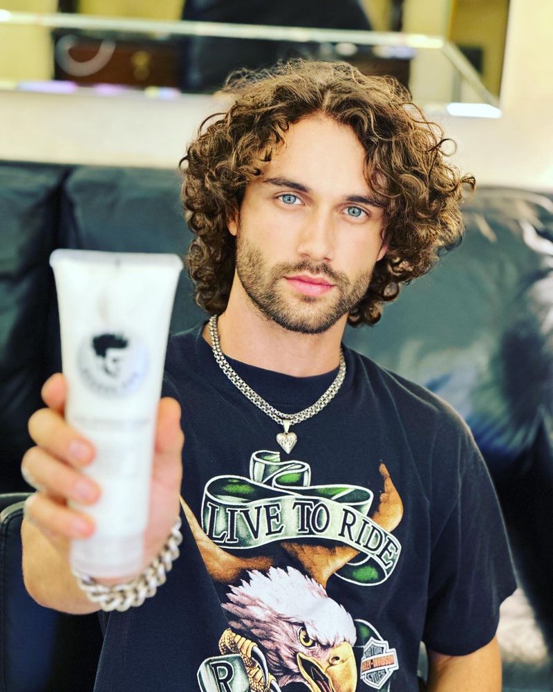 man with curly hair